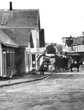 c. 1883-1890. Ben Dexter's double store is on the far left.